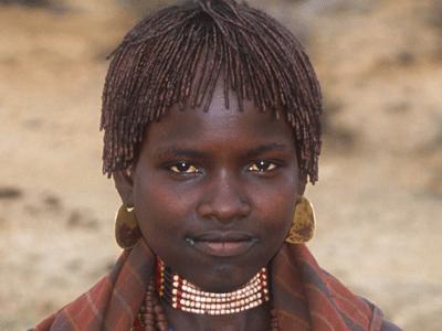 A young Hamer woman in the Omo Valley.