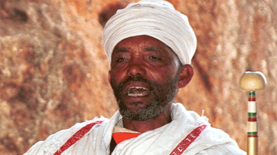 A priest sings church hymns in Lalibela, Ethiopia
